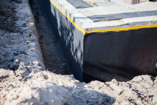 Professional Wet Basement Repair technician working in Greenville, PA